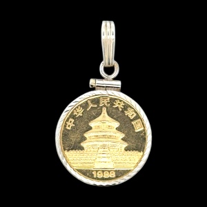 1988 1/10th Oz. .999 Panda Coin Pendant With a 14K Yellow Gold Bezel